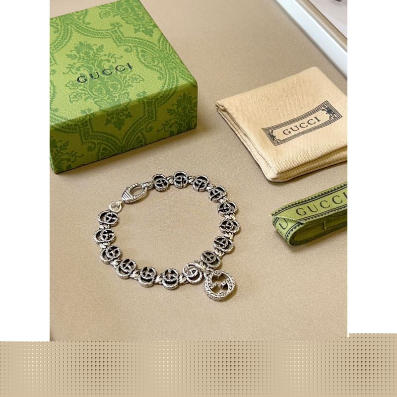 G*u*i bracelets